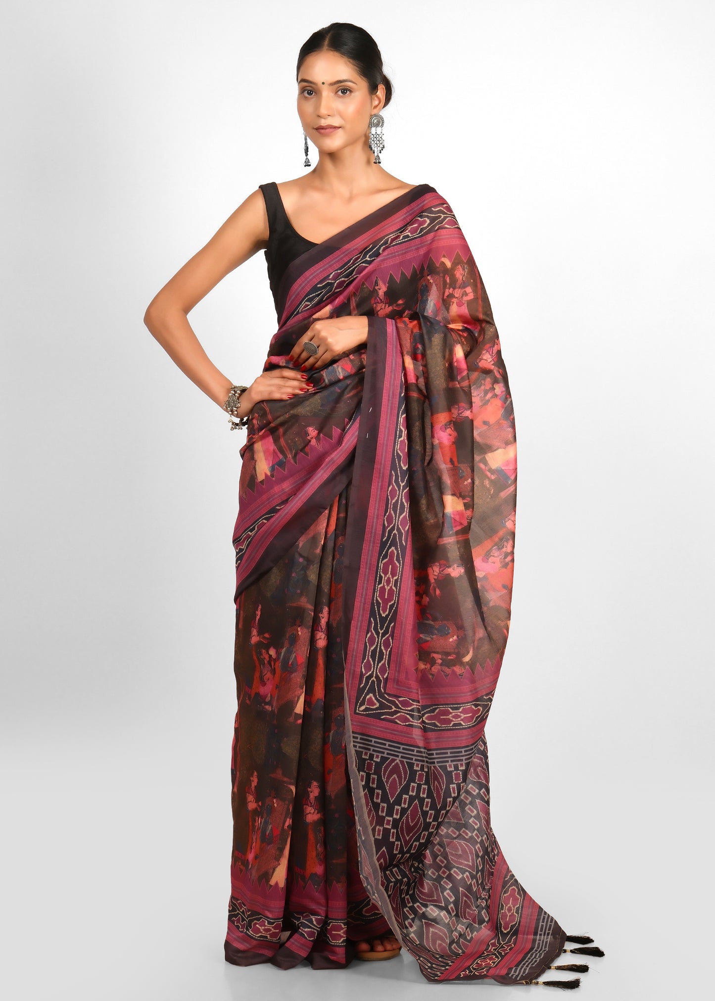Close-up of the Krishna Rasleela motif on a handwoven Ikat saree, showcasing the intricate artistry.