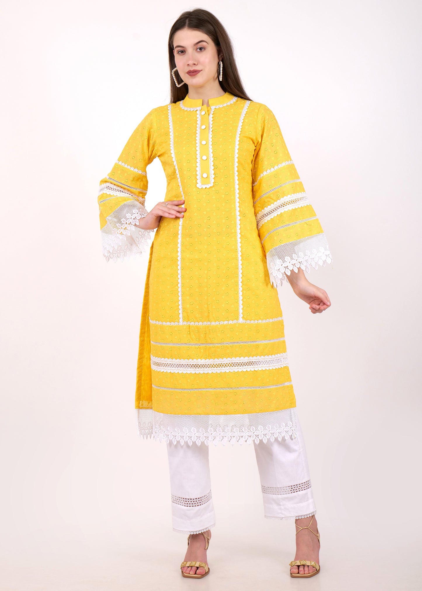 Front view of a yellow embroidered kurta with lace detailing and buttoned neckline paired with white straight pants, perfect for a summer festive look