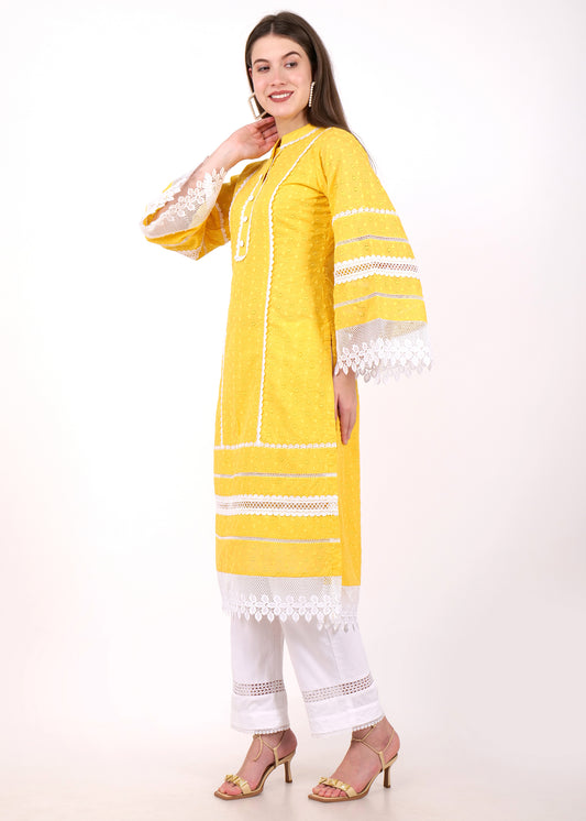 Side view of a yellow kurta featuring lace accents on the bell sleeves and hemline, paired with white embroidered pants, ideal for casual and semi-formal occasions.