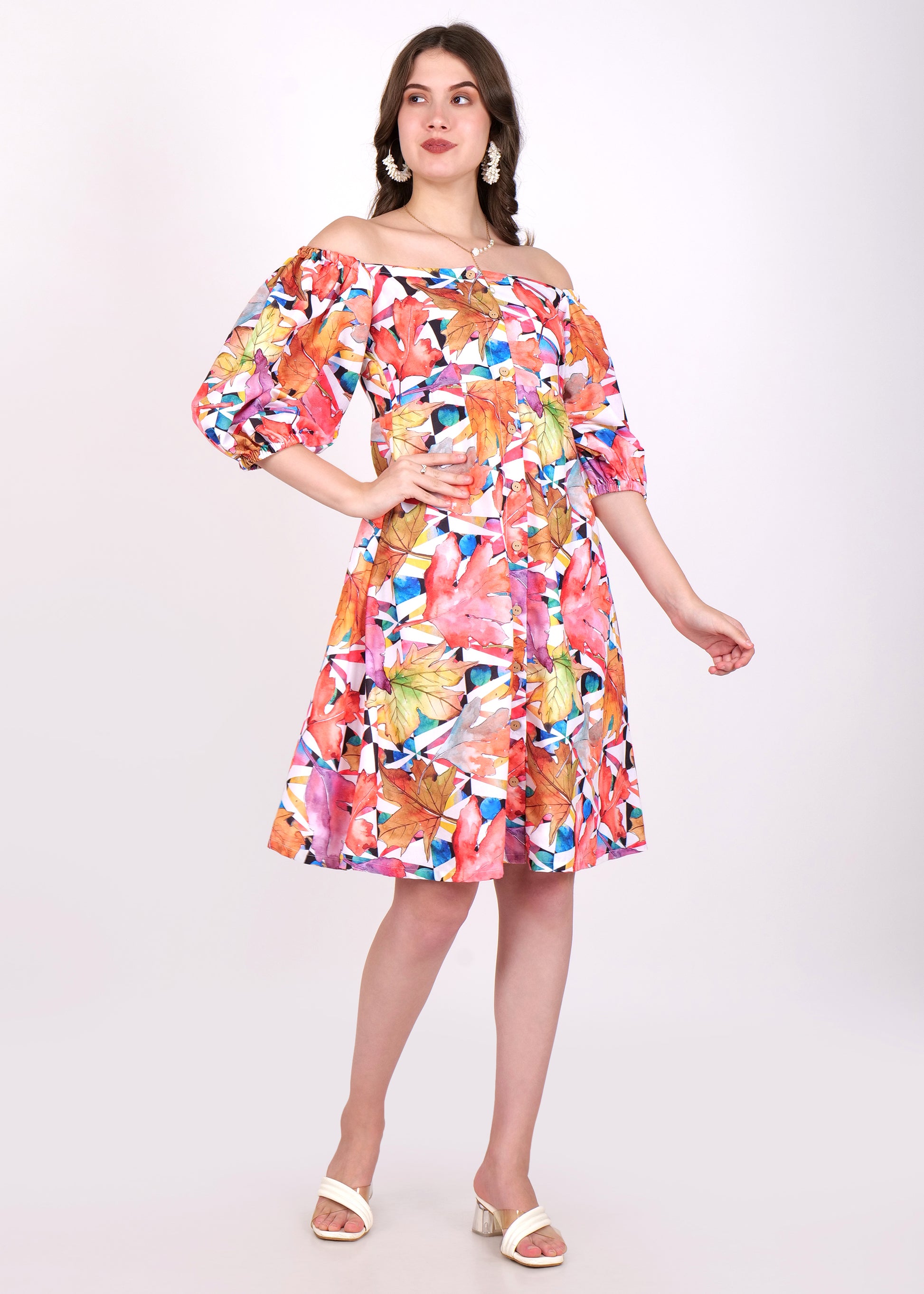 Another frontal view of the colorful dress, emphasizing the detailed leaf pattern and the lightweight, airy design of the garment