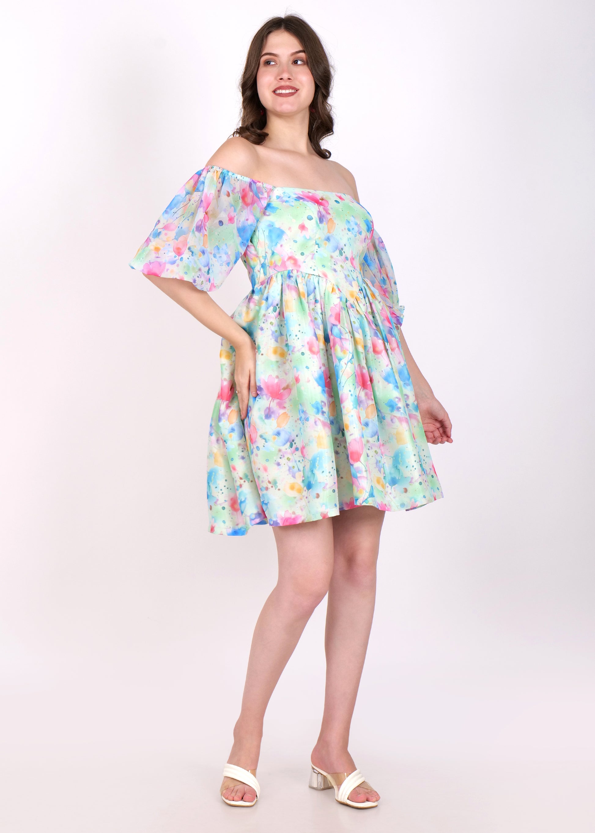 Full view of a watercolor floral printed dress in a feminine off-shoulder design