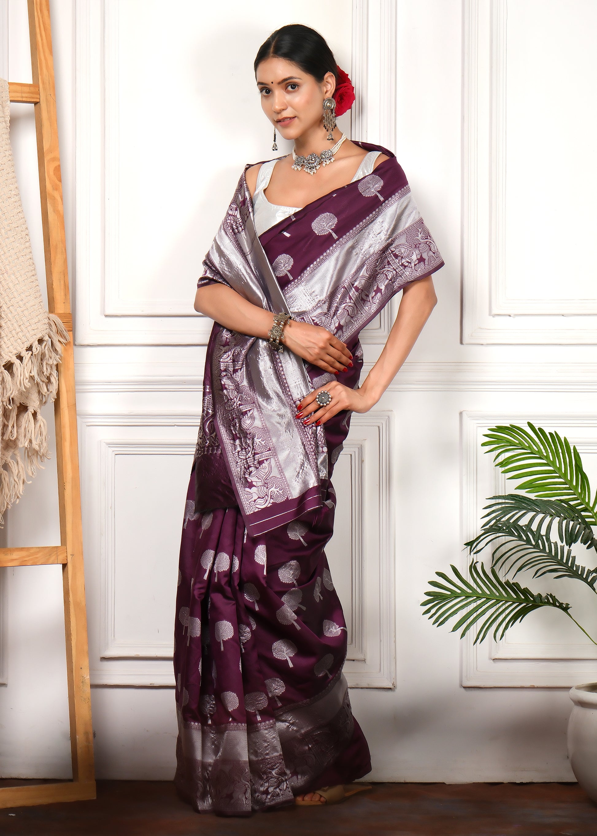 Front Pose of Model in Purple and Silver Banarasi Saree with Tree Embroidery
The model poses in a full-length view, flaunting the rich purple Banarasi saree with silver tree embroidery and a beautifully detailed pallu.