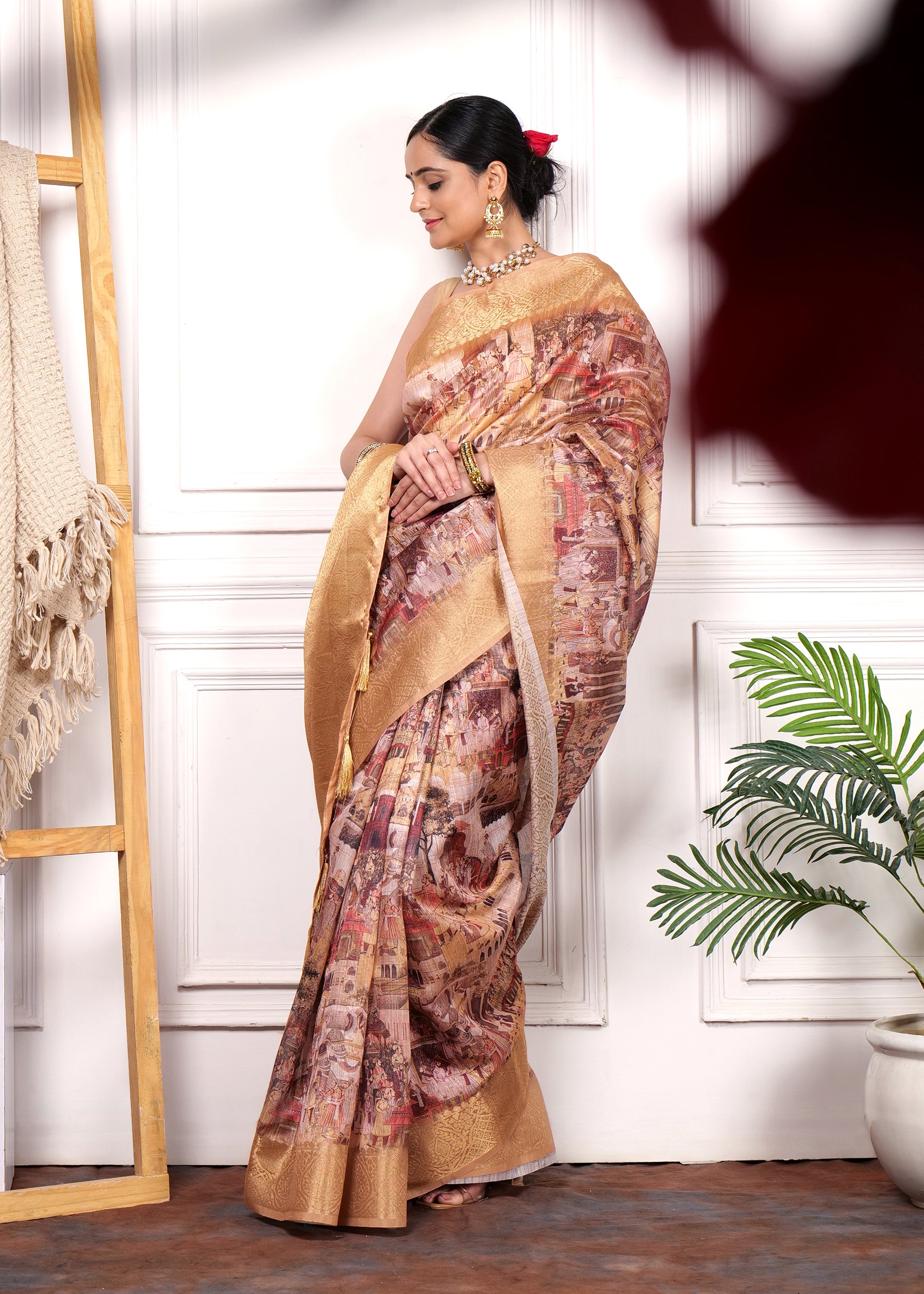 A poised model draped in a Krishna Rasleela Banarasi saree, standing against a white backdrop with soft lighting, showcasing the detailed craftsmanship